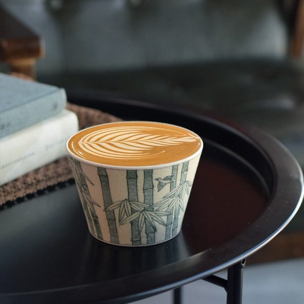 This handcrafted ceramic mug, perfect for pairing with a latte, brings elegance and style to your office desk, ideal for professionals.
