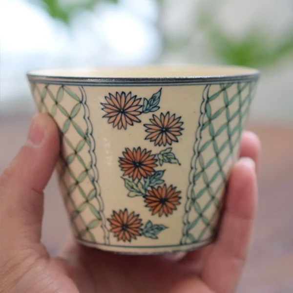Handheld Ceramic Coffee Mug with Pink Chrysanthemum and Geometric Lattice Design