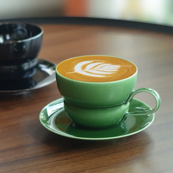 A cup of rich coffee in a gourd-shaped ceramic coffee mug, personalized European style, perfect as a thoughtful gift for family and friends