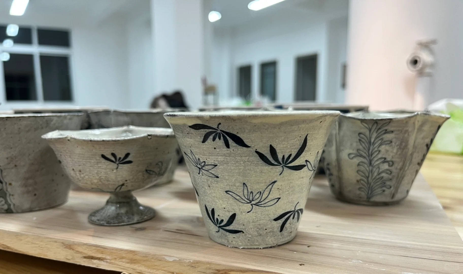 Handcrafted porcelain pieces with floral decoration