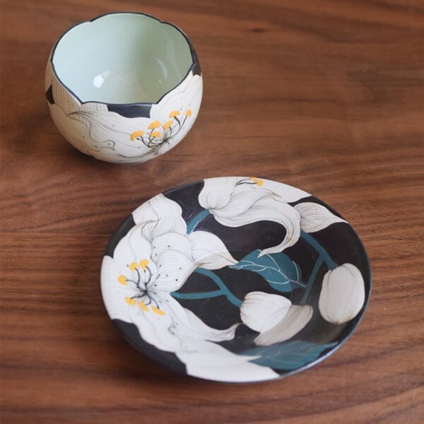 Hand-painted Lily Cup and Saucer, perfect for enjoying coffee during travel