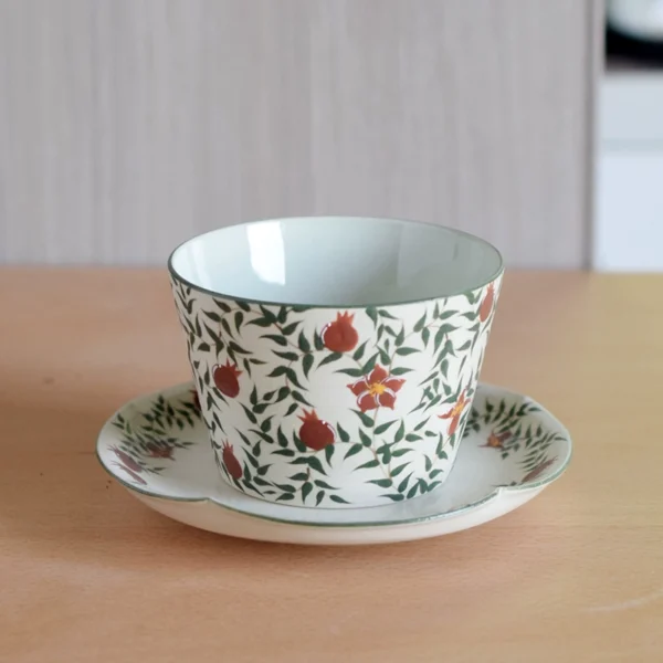 Hand-painted pomegranate flower ceramic coffee cup and saucer, handmade, handleless design, perfect as a gift cup