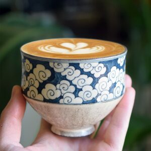 handheld-ceramic-coffee-cup-cloud-pattern-vintage-style-800×800 Handheld ceramic cup filled with coffee, hand-painted cloud pattern, vintage style coffee cup