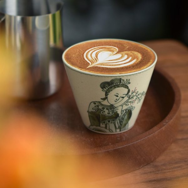 Heart-Shaped Cappuccino in Ceramic Coffee Mug, Placed on Wooden Tray Waiting for Guests to Enjoy