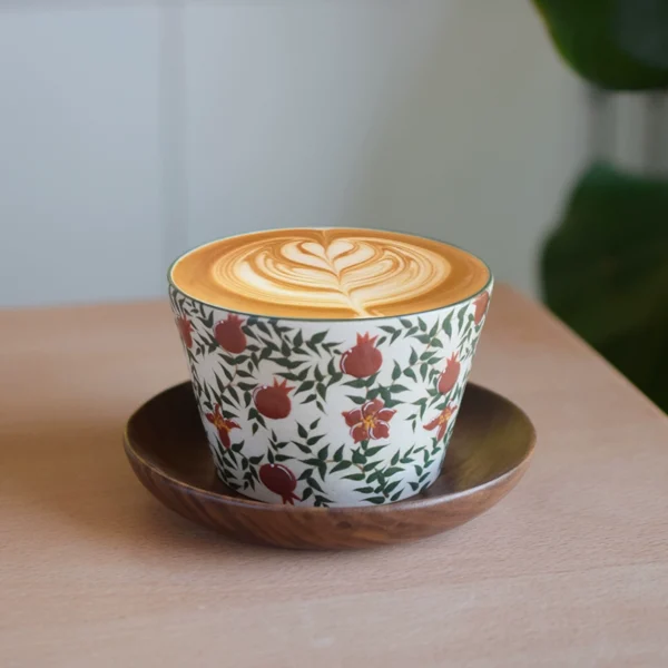 High-temperature ceramic coffee cup with hand-painted pomegranate flower pattern, easy to clean, an essential in your kitchen