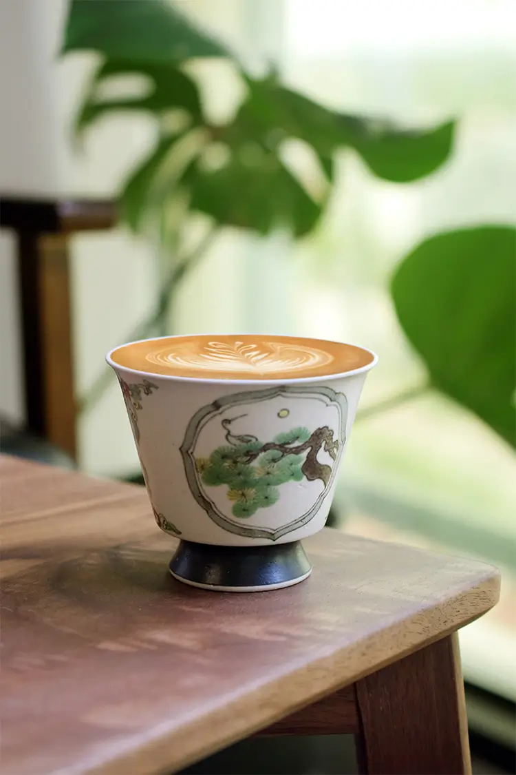 Handmade ceramic tableware showcases vintage Chinese style for serving coffee at family gatherings.