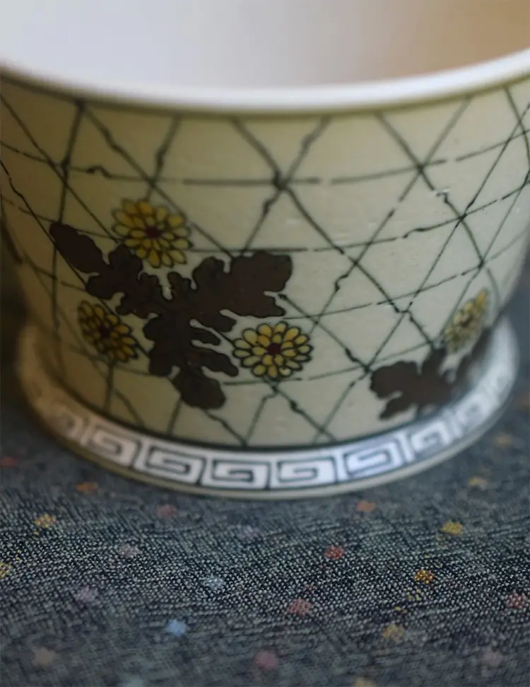 Business ceramic coffee mug features hand-painted underglaze chrysanthemum, expressing calm elegance with a vintage Chinese flair.