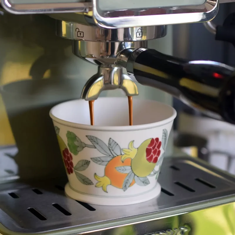 Ceramic custom made coffee mugs with underglaze pomegranate art pair perfectly with any coffee machine.