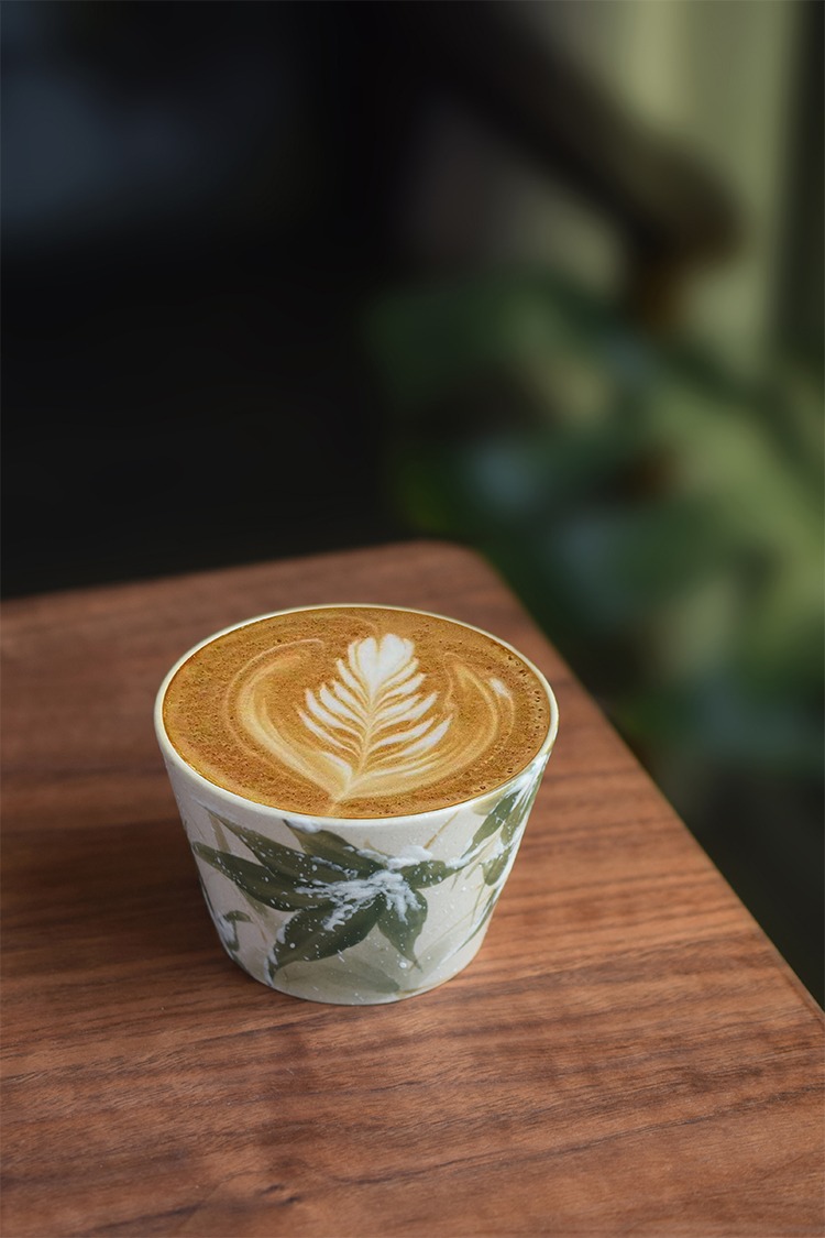 Chinese-style handmade ceramic coffee cup with hand-painted snow bamboo pattern and elegant craftsmanship