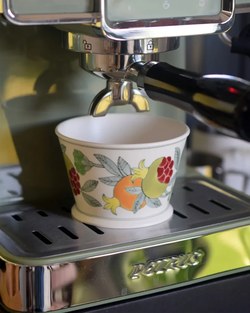 Custom ceramic cup with hand-painted pomegranate suits various occasions and coffee machines.
