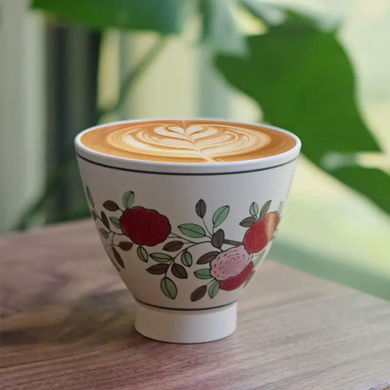 Custom ceramic cup with underglaze finish, ideal for enhancing your morning coffee routine.