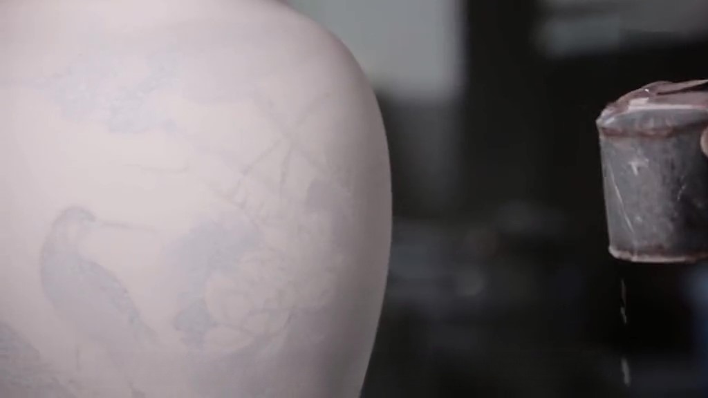 Traditional ceramic technique where glaze is blown onto porcelain, ensuring even distribution for a specific effect