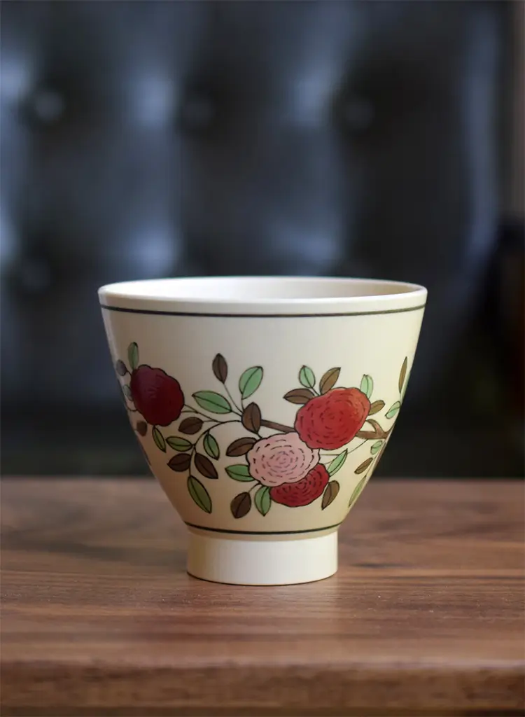 Hand-painted camellia cup, perfect for daily use in your workspace, blending elegance with functionality.