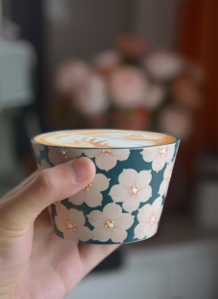 Hand-painted cherry blossom ceramic coffee cup, ideal for latte and Mother's Day gifting.