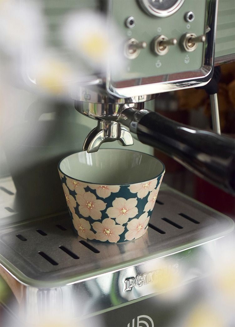 Handmade ceramic coffee cup compatible with espresso machines, ideal for home or office use.