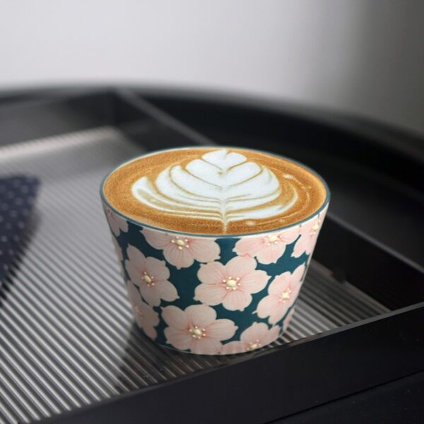 Handcrafted ceramic cup showcasing cute style and high-quality craftsmanship