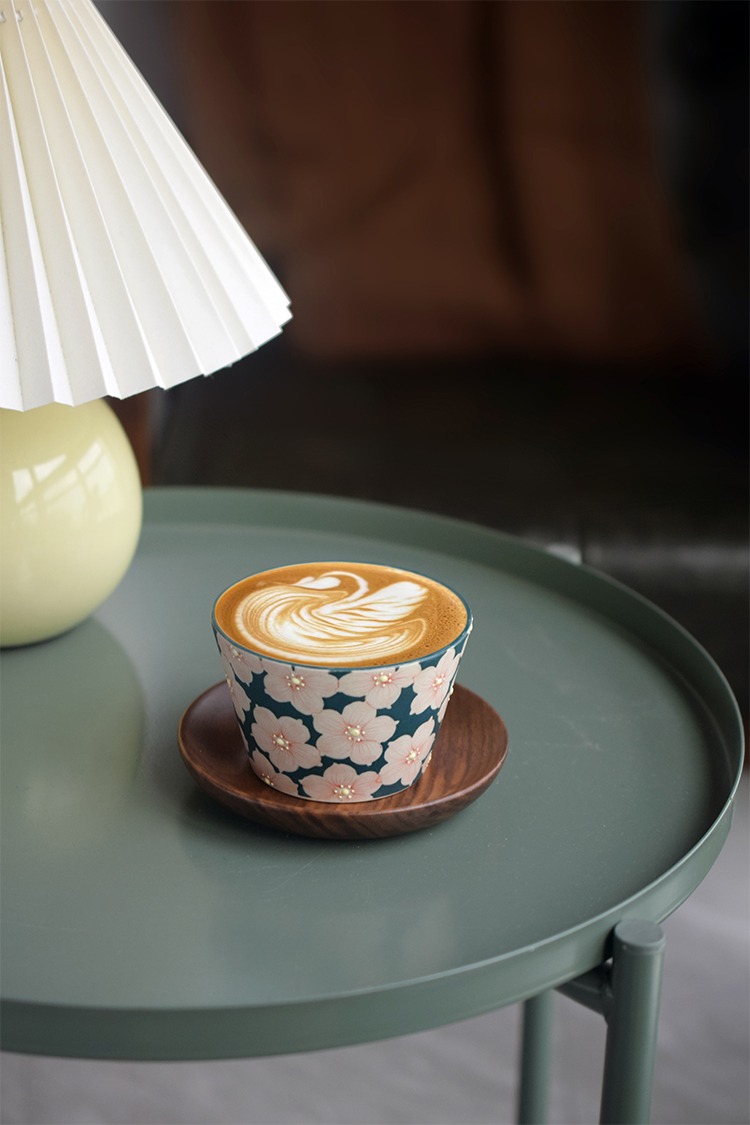 Handmade ceramic espresso cup perfectly sized for concentrated coffee enjoyment.
