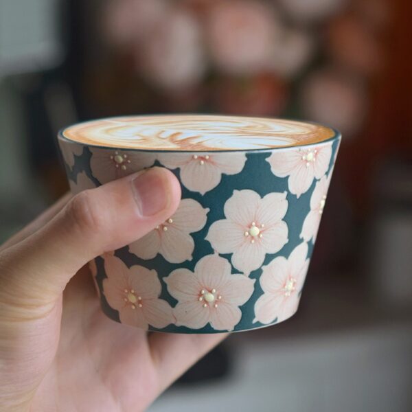Nordic-style handheld ceramic coffee cup, custom handmade, ideal for office use.