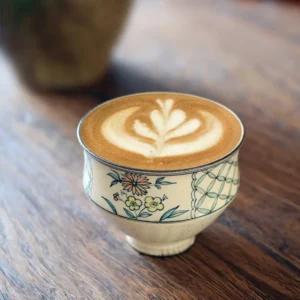 Elegant handmade ceramic cup with hand-painted chrysanthemum, ideal for dignified gifting and formal occasions