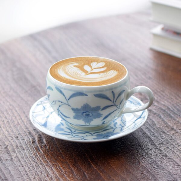 Handmade ceramic tea set placed on table perfect for vegans .