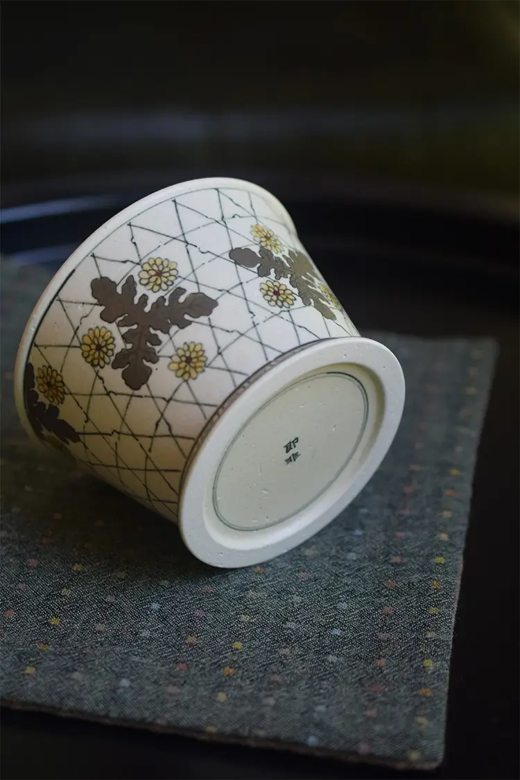 Handmade porcelain coffee mug from JIFEI collection suits daily tea or latte with timeless elegance.