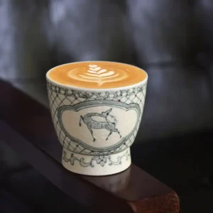 Handmade pottery coffee mug with blue and white deer design – a unique Teacher’s Day gift