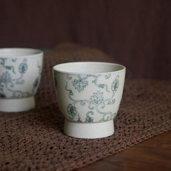 Pair of hand-painted lychee texture ceramic cups in Chinese style, designed for café use