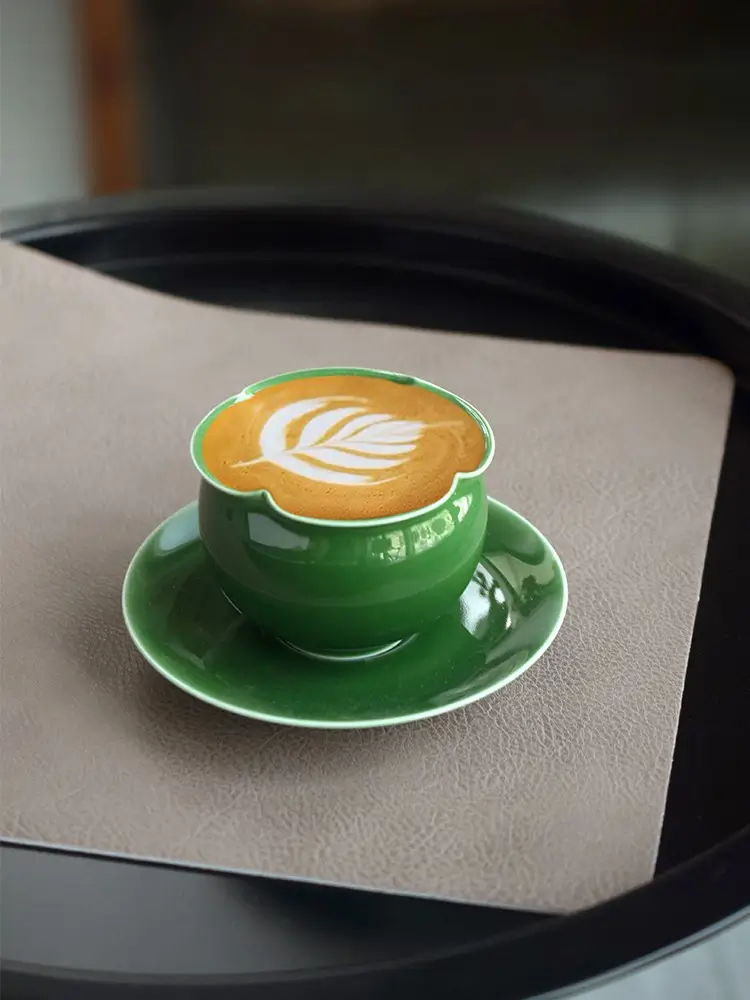 High-fired ceramic cup with floral rim adds elegance to minimalist lifestyles.