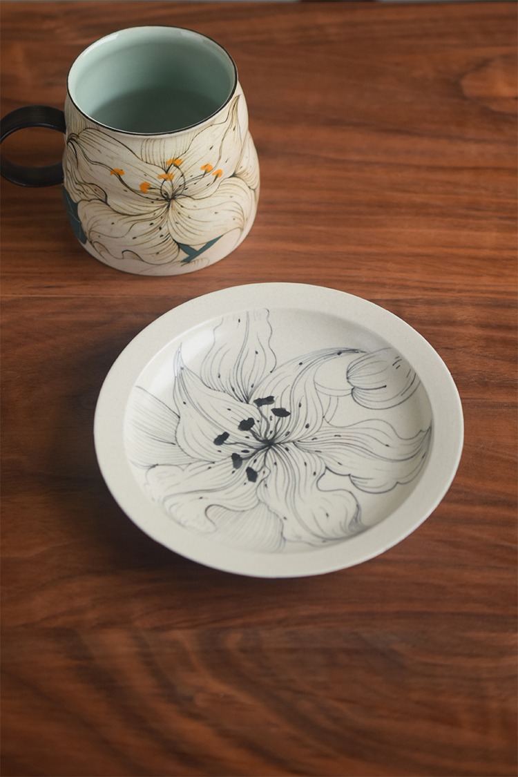 Hand-painted lily flower ceramic mug with saucer in Nordic style, perfect for coffee lovers and gifting.