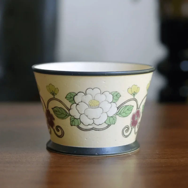 Custom Chinese ceramic tea cup features a 270ml capacity with underglaze hand-painted motif for elegant office use.