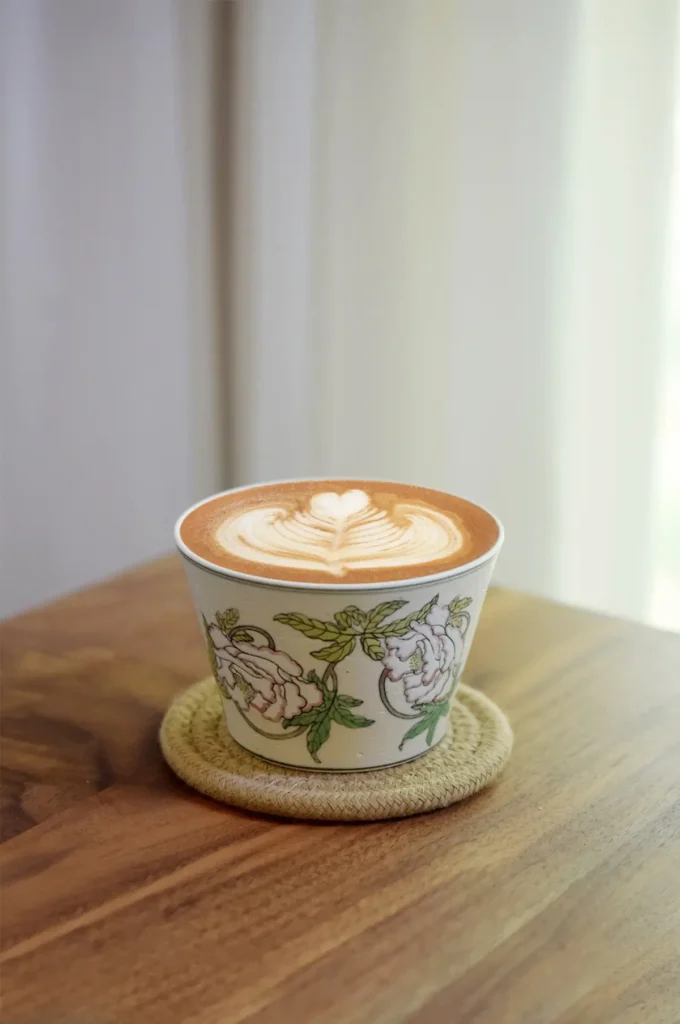 Handmade ceramic coffee mug uses traditional techniques, offering a refined touch to your business coffee moments.