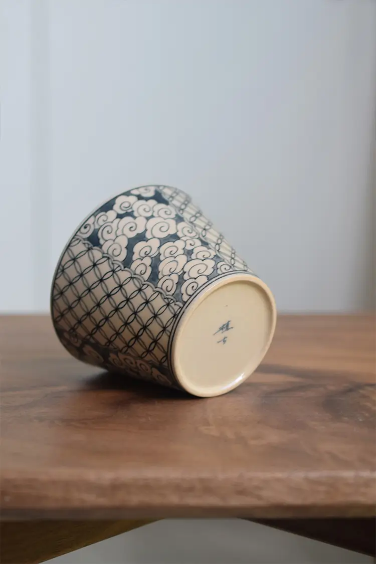 Peonyceramics ZHIGU series ceramic cup base close-up showing fine craftsmanship and smooth, refined finish.