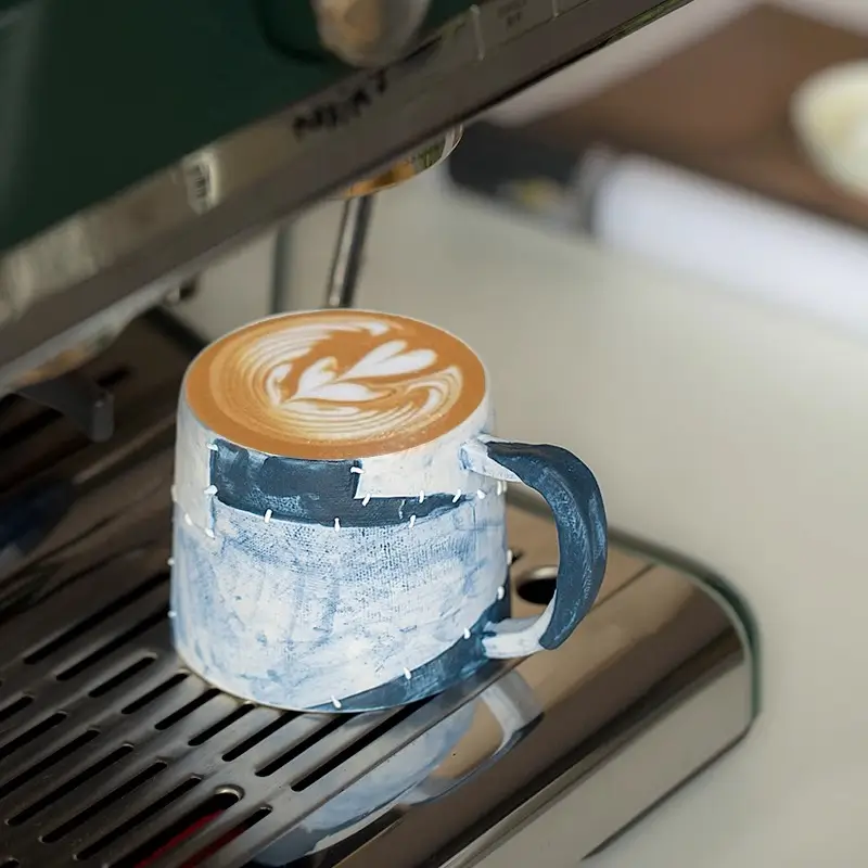 Handmade coffee cup designed to fit espresso machines and daily brewing needs.