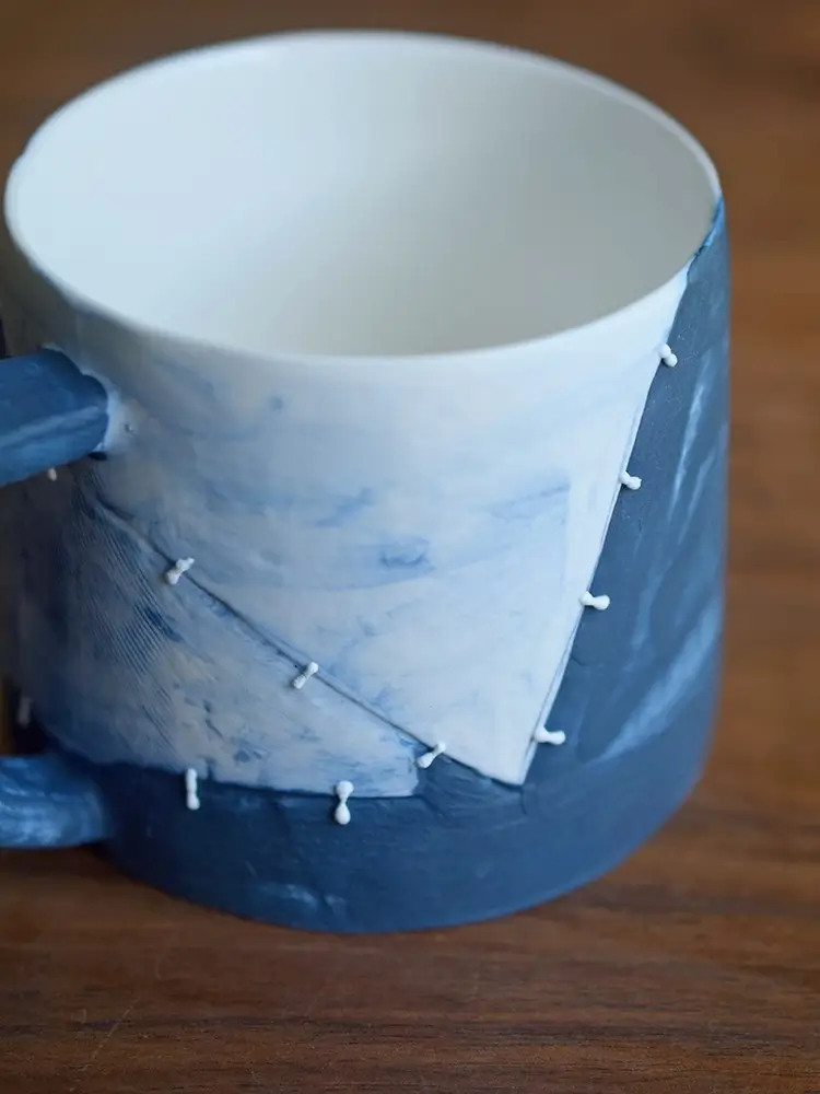 Custom ceramic mug with a matte exterior and glossy glazed interior, perfect for daily coffee.