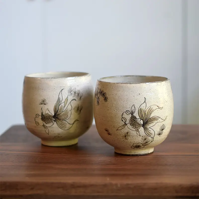 Handmade ceramic mug crafted with coarse clay and white slip glaze, ideal for daily coffee, tea, or other hot beverages
