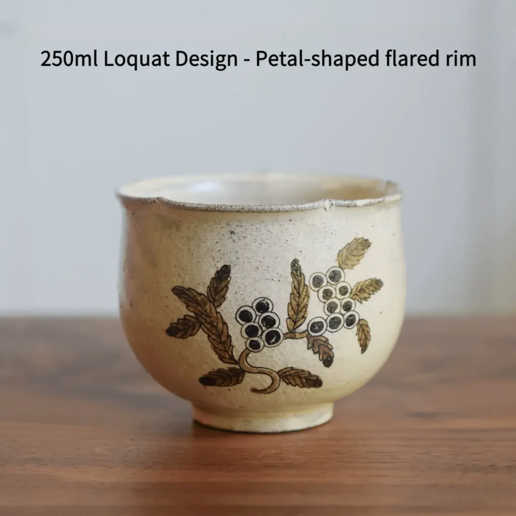 Vintage ceramic coffee mug with hand-painted loquat design in underglaze, perfect for daily office use
